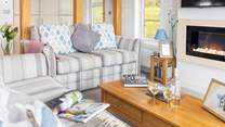 The living area offers the perfect place to sit back and relax whilst reading a book or watching a film.