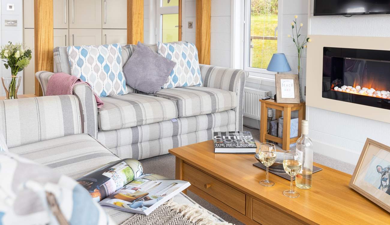 The living area offers the perfect place to sit back and relax whilst reading a book or watching a film.