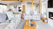 The open plan living arrangement allows all the family to come together. 