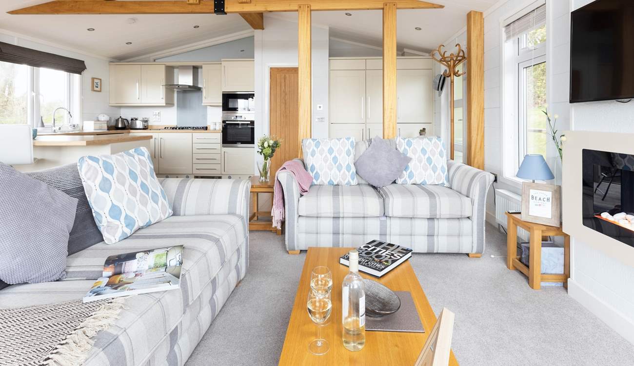 The open plan living arrangement allows all the family to come together. 