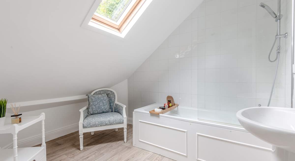 The fabulous bathroom. Enjoy a relaxing soak or a refreshing rainfall shower.