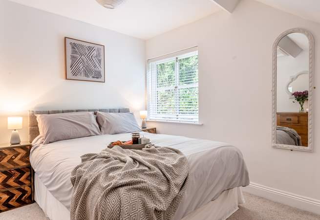 Bedroom 1 is a delight with king-size bed and high vaulted ceilings.