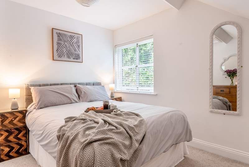 Bedroom 1 is a delight with king-size bed and high vaulted ceilings.