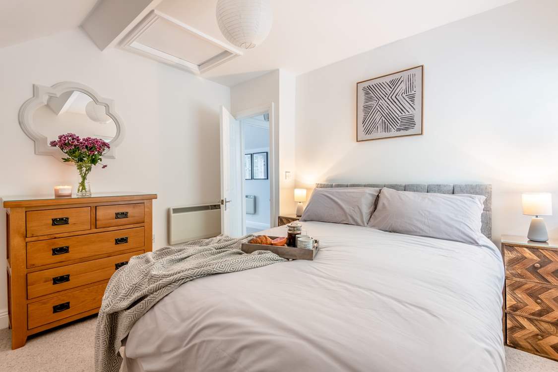 A room to delight with views out towards the woods!