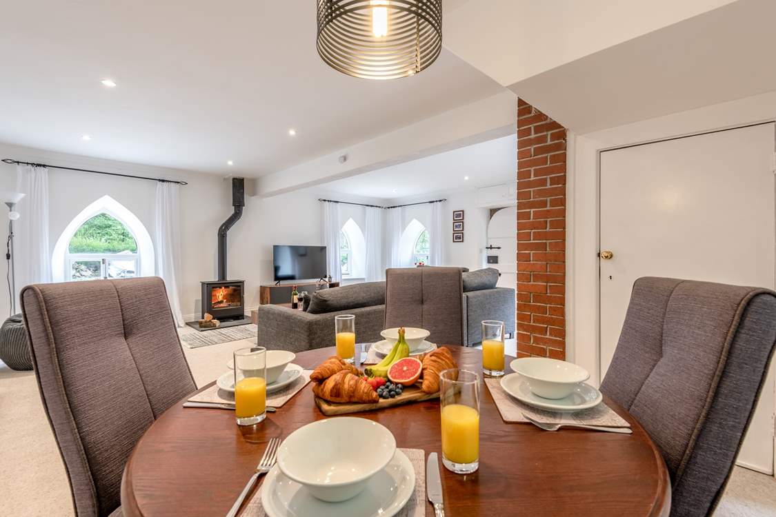 The sociable living space fills with natural light.