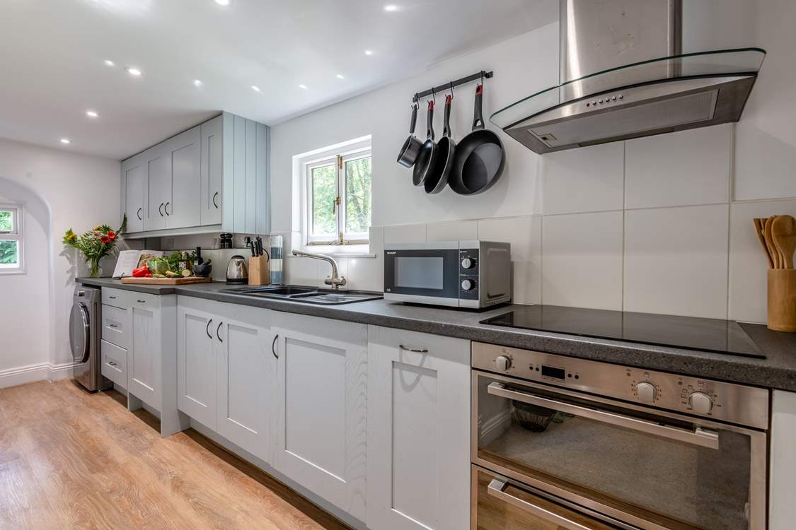 The sleek kitchen has everything you will need for cooking a holiday feast.