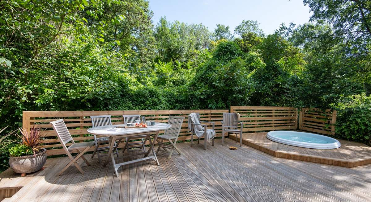 Spend the day listening to birdsong, relaxing in the hot tub and dining al fresco.