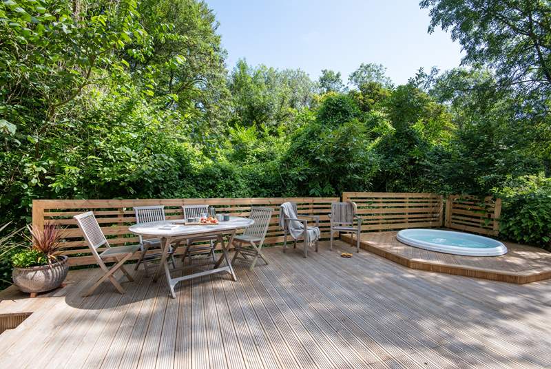 Spend the day listening to birdsong, relaxing in the hot tub and dining al fresco.