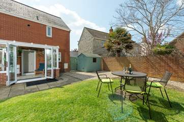 Throw open the conservatory doors and enjoy your enclosed garden.