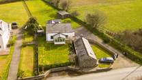 Welcome to Beudy Gwyn (The White Cowshed) .... just look at the huge lawned garden.