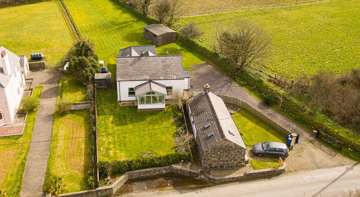 Welcome to Beudy Gwyn (The White Cowshed) .... just look at the huge lawned garden.