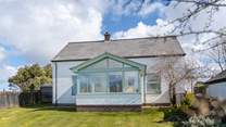 Spend time in the enclosed front garden or in the large enclosed lawned garden to the rear.