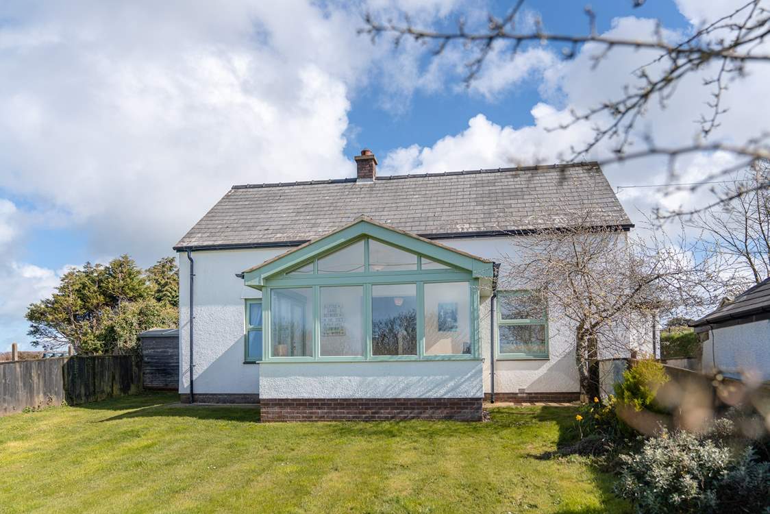 Spend time in the enclosed front garden or in the large enclosed lawned garden to the rear.