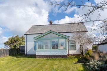 Spend time in the enclosed front garden or in the large enclosed lawned garden to the rear.