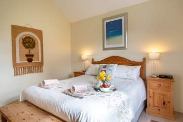 Spacious ground floor double room with king-size bed.