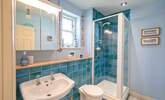 Calming blues in the attractive en suite shower-room. - Thumbnail Image