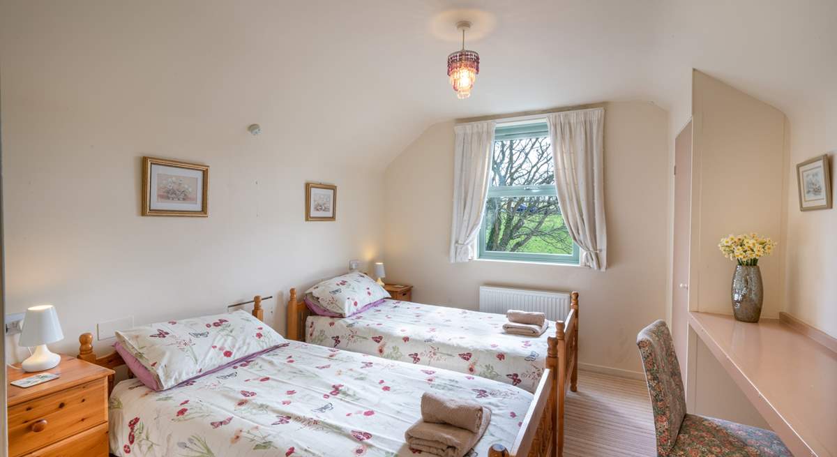 Enjoy the rural views from the sunny twin room on the first floor.