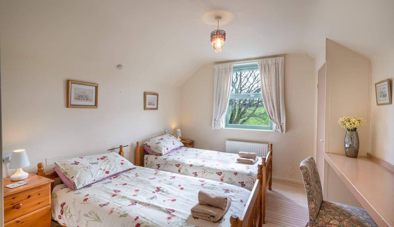 Enjoy the rural views from the sunny twin room on the first floor.