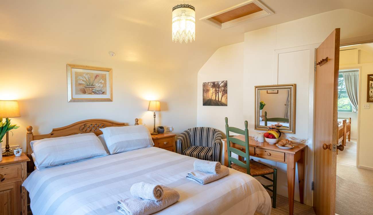 The first floor double bedroom is next to the twin room.