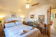 The first floor double bedroom is next to the twin room.