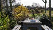 Listen to the sweet melody of  birdsong from under the pergola, marvelling at the spellbinding sea views.