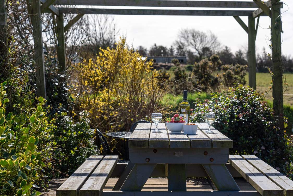 Listen to the sweet melody of  birdsong from under the pergola, marvelling at the spellbinding sea views.