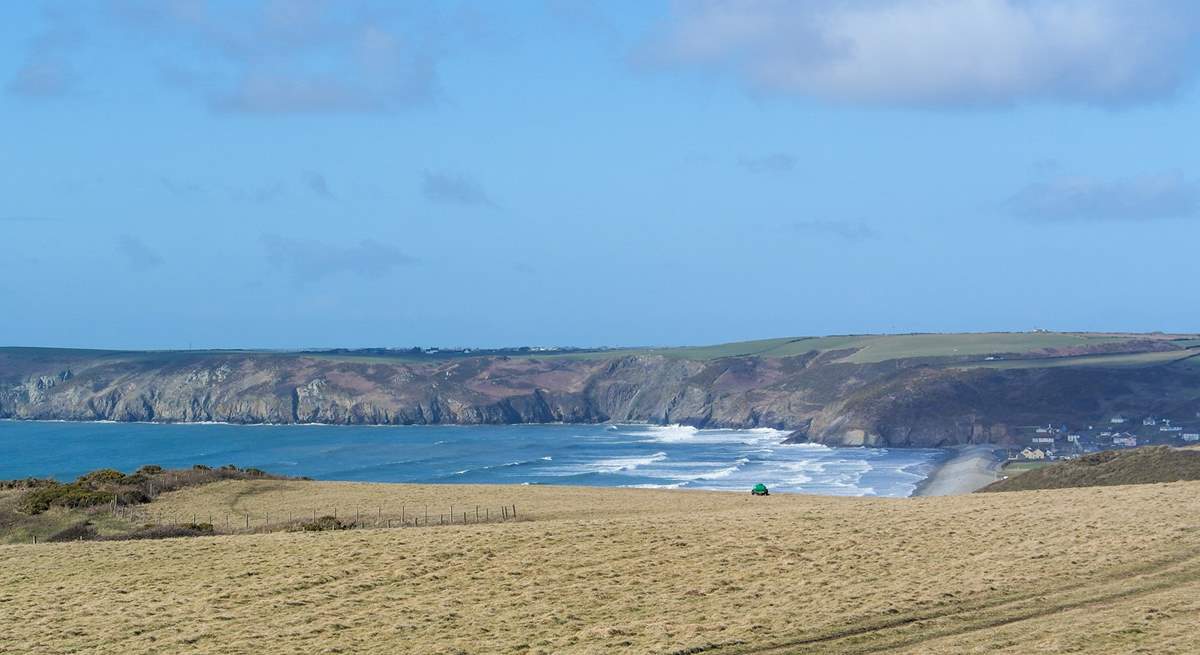 Glorious Newgale Beach, with almost 2 miles of never-ending golden sands, high pebble bank and most days, exhilarating waves. Ideal for kite surfers and surfers, whilst children love the sandy beach.