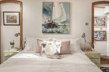 The comfortable V-shaped bed in the second bedroom can also be converted into twins.