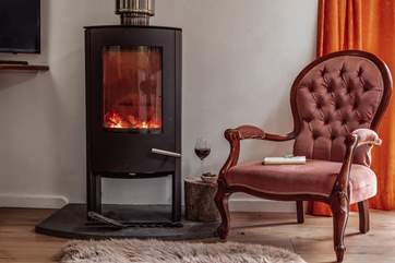 Inside there is also a cosy wood-burner, a glass of red and a good book... pure bliss!
