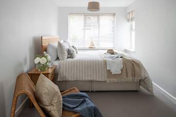 The main bedroom on the ground floor. This room also has an en suite shower-room.