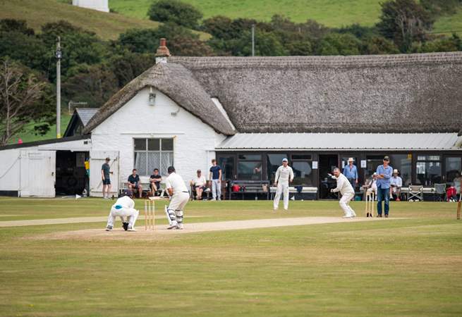 A match at the local cricket club in full swing.
