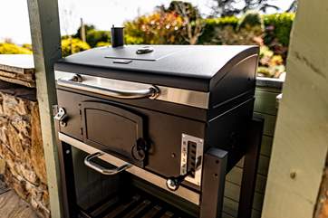 The charcoal barbecue will allow you to cook up a storm whilst you watch the children play!