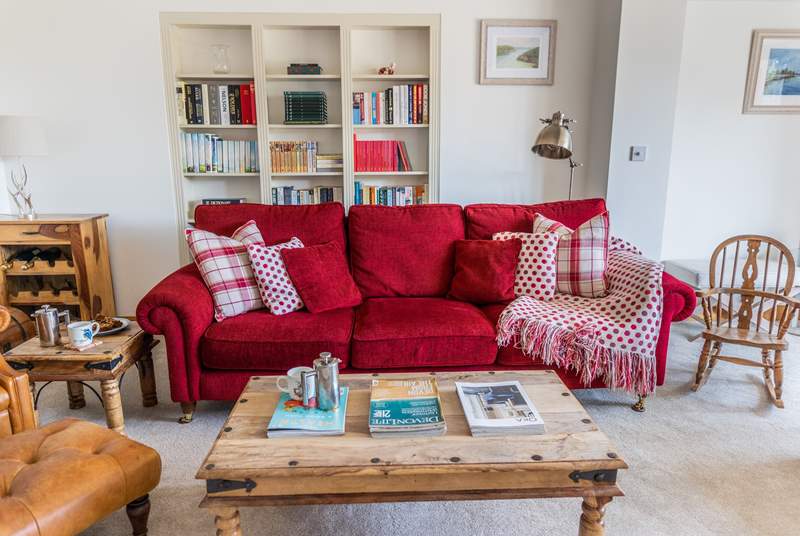 The sitting-room is cosy and comfy making the perfect room for a family film night in. The 49