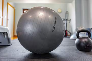 The gym also offers a small work station with another set of patio doors opening up on the that 'wow' garden.