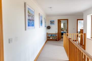 The landing links all the bedrooms and family shower-room together.