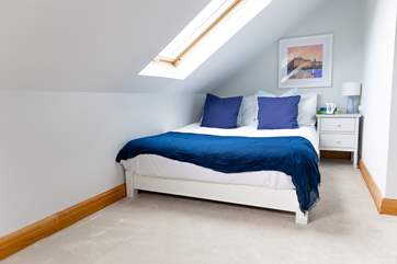 Another double which floods with light, please note that there is restricted head room and also the bed is pushed against the wall on one side.