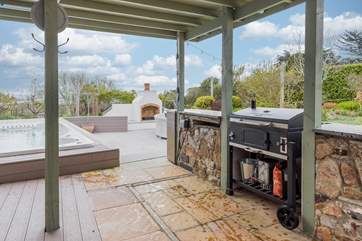 The charcoal barbecue will allow you to cook up a storm whilst you watch the children play.