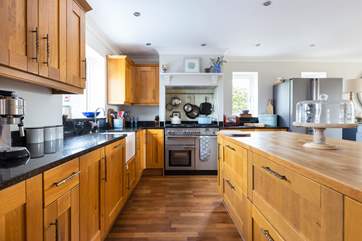 The kitchen/diner is fully equipped for the chef of the family.