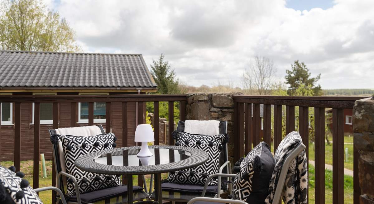 The decking area is just the spot to enjoy al fresco dining.