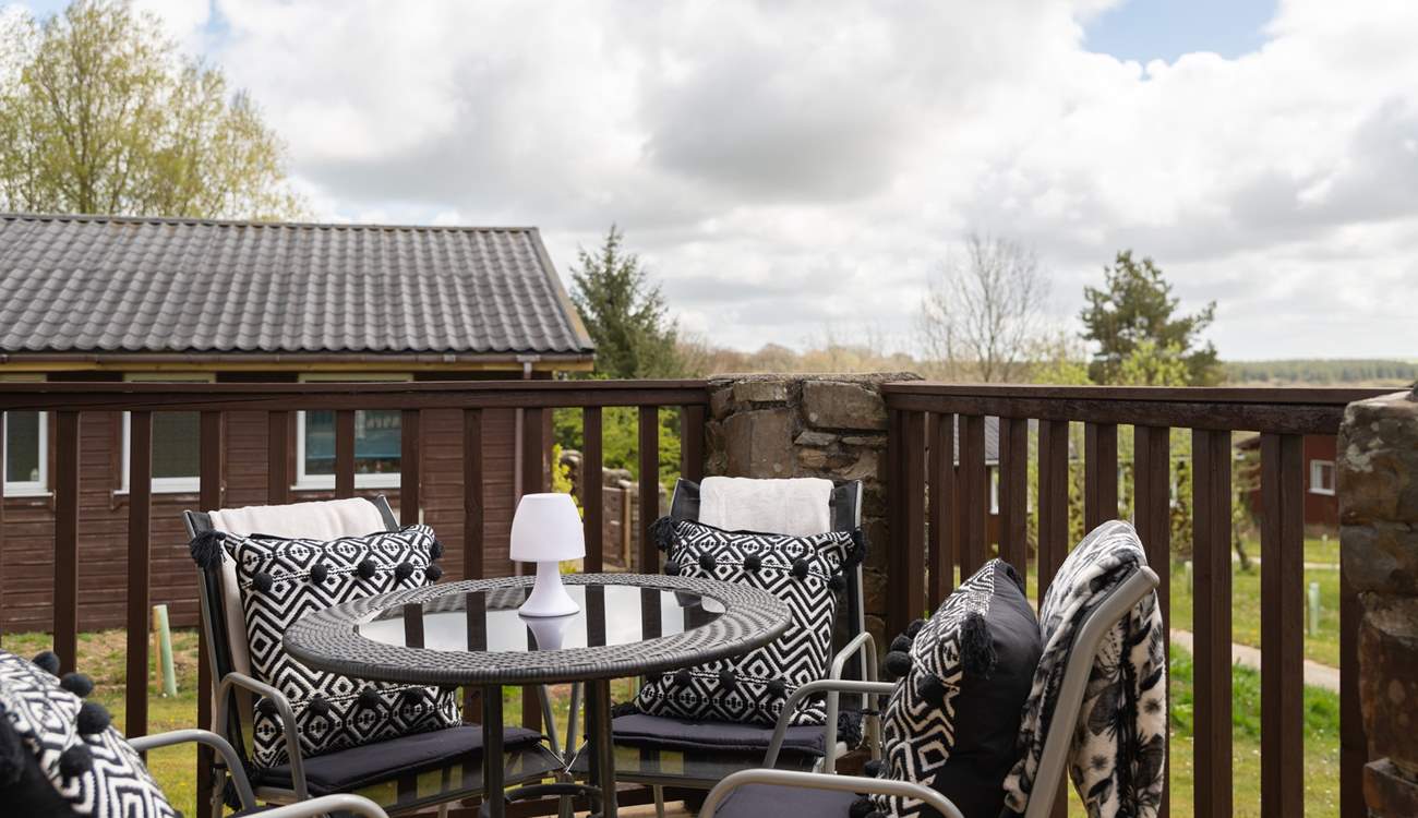 The decking area is just the spot to enjoy al fresco dining.