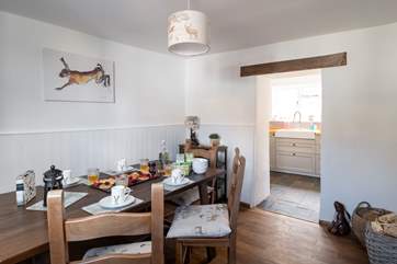 From the dining-room you can access the kitchen that sits as the back of the cottage.