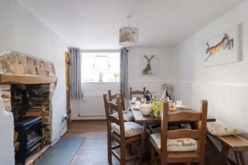 The dining-room has a handy electric wood-burner.