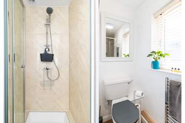 The en suite shower-room for bedroom two also has an heated towel rail.