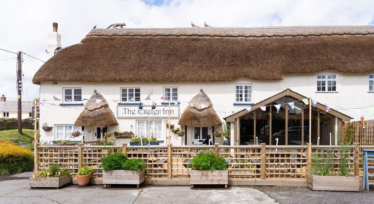 Take a look at the top of the thatched inn - you can see the fox that your cottage is named after.