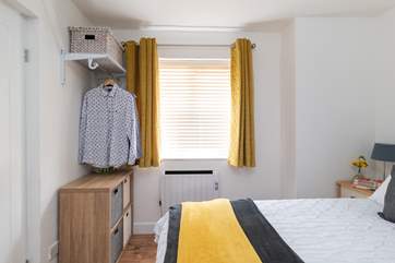 Each bedroom has been furnished to free up floor space.