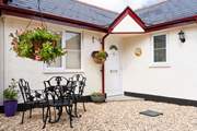 Welcome to Foxglove Cottage, tucked behind the Exeter Inn.