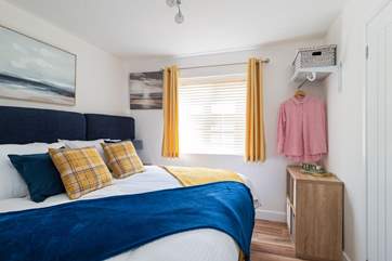 Bedroom two has a 'zip and link' bed and en suite shower-room.