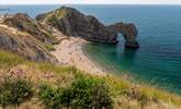 The Durdle Door and lush blue waters are waiting for you. - Thumbnail Image