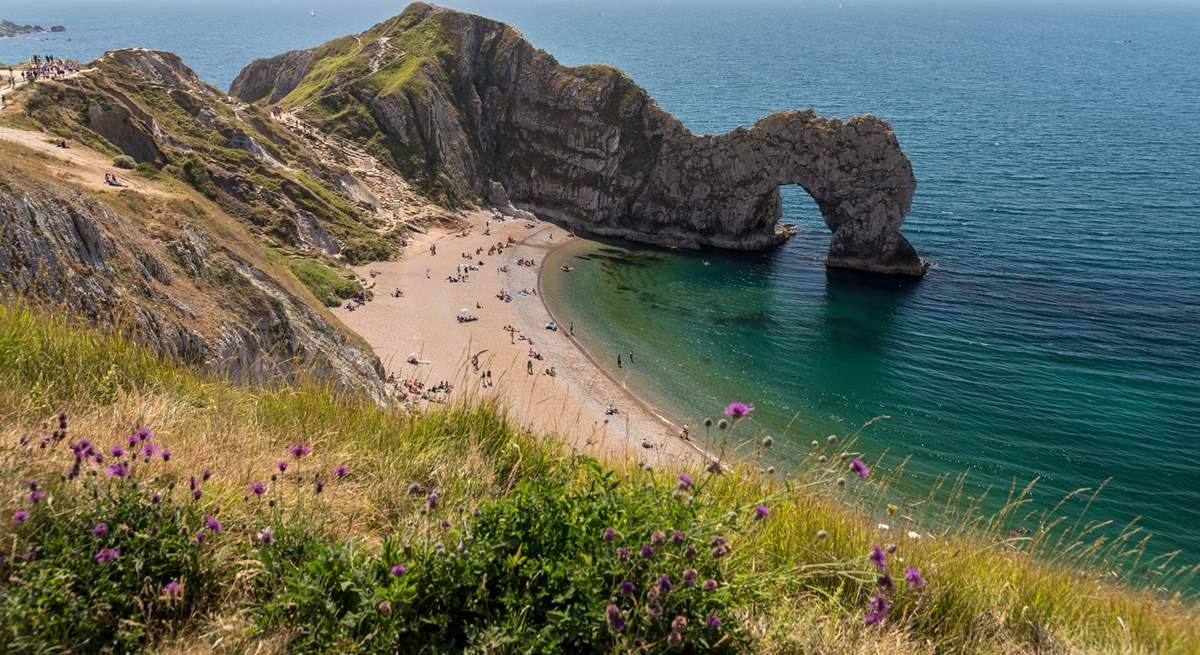 The Durdle Door and lush blue waters are waiting for you.