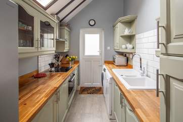 Modern and well-equipped; the galley kitchen has lovely character.